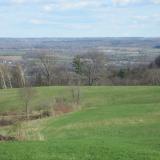 Looking south from nearly the hight of land on the way out of the town of Fonda. (Author: vic rzonca)