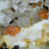 WulfenitaLabores mineras del paraje Matagallar, Coín, Comarca Valle del Guadalhorce, Málaga, Andalucía, EspañaCampo de visión de 5 mm. (Autor: Antonio Carmona)