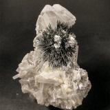 Stibnite on BariteMina Herja, Chiuzbaia, Baia Sprie, Maramures, RumaníaH: 10.5cm x W: 7.8cm x D: 3.4cm (Author: Adrian Pripoae)