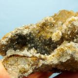 Quartz, Calcite, jouravskite?, manganite<br />N'Chwaning II Mine, N'Chwaning mining area, Kuruman, Kalahari manganese field (KMF), Northern Cape Province, South Africa<br />87 x 71 x 55 mm<br /> (Author: Pierre Joubert)