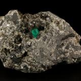 Beryl (variety emerald), Calcite, Pyrite<br />Muzo mining district, Western Emerald Belt, Boyacá Department, Colombia<br />76x47x45mm, xl=7x5mm<br /> (Author: Fiebre Verde)