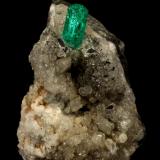 Beryl (variety emerald), Calcite<br />Chivor mining district, Municipio Chivor, Eastern Emerald Belt, Boyacá Department, Colombia<br />25x25x32mm, xl=8x3mm<br /> (Author: Fiebre Verde)