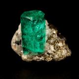 Beryl (variety emerald), Calcite, Pyrite<br />Chivor mining district, El Oriente Mine, Municipio Chivor, Eastern Emerald Belt, Boyacá Department, Colombia<br />xl=12x6mm<br /> (Author: Fiebre Verde)