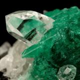 Beryl (variety emerald), Calcite, Quartz<br />Muzo mining district, Western Emerald Belt, Boyacá Department, Colombia<br />53x39mm, xl=25x23mm<br /> (Author: Fiebre Verde)