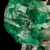 Beryl (variety emerald), Calcite, Quartz<br />Muzo mining district, Western Emerald Belt, Boyacá Department, Colombia<br />53x39mm, xl=25x23mm<br /> (Author: Fiebre Verde)