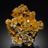 Sharp yellow wulfenite crystals to 0.8 cm. (Author: crosstimber)