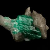 Beryl (variety emerald), Calcite, Quartz<br />La Pita mining district, Municipio Maripí, Western Emerald Belt, Boyacá Department, Colombia<br />21x35mm, cluster=20mm long<br /> (Author: Fiebre Verde)