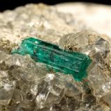 Beryl (variety emerald), Dolomite, Pyrite<br />Chivor mining district, San Gregorio Mine, Municipio Chivor, Eastern Emerald Belt, Boyacá Department, Colombia<br />30x29x41mm, main xl=10mm<br /> (Author: Fiebre Verde)