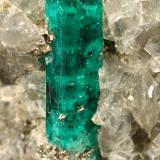 Beryl (variety emerald), Dolomite, Pyrite<br />Chivor mining district, San Gregorio Mine, Municipio Chivor, Eastern Emerald Belt, Boyacá Department, Colombia<br />30x29x41mm, main xl=10mm<br /> (Author: Fiebre Verde)