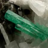 Beryl (variety emerald), Calcite<br />Coscuez mining district, Municipio San Pablo de Borbur, Western Emerald Belt, Boyacá Department, Colombia<br />51x46x46mm, cluster=20mm<br /> (Author: Fiebre Verde)