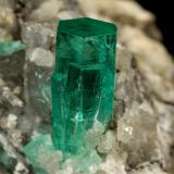 Beryl (variety emerald), Calcite<br />Coscuez mining district, Municipio San Pablo de Borbur, Western Emerald Belt, Boyacá Department, Colombia<br />30x49x29mm, xl=9x4mm<br /> (Author: Fiebre Verde)