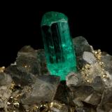 Beryl (variety emerald), Calcite, Pyrite<br />Chivor mining district, Municipio Chivor, Eastern Emerald Belt, Boyacá Department, Colombia<br />19x14x21mm, xl=7mm<br /> (Author: Fiebre Verde)