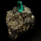 Beryl (variety emerald), Calcite, Pyrite<br />Chivor mining district, Municipio Chivor, Eastern Emerald Belt, Boyacá Department, Colombia<br />19x14x21mm, xl=7mm<br /> (Author: Fiebre Verde)