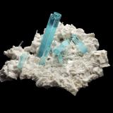 Beryl (variety aquamarine) on AlbiteShigar Valley, Shigar District, Gilgit-Baltistan (Northern Areas), Pakistan29,0 	x	24,0	x	14,0	cm (Author: MIM Museum)