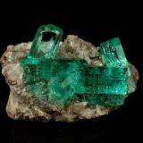 Beryl (variety emerald), Calcite, Pyrite<br />Chivor mining district, Municipio Chivor, Eastern Emerald Belt, Boyacá Department, Colombia<br />largest xl=11mm<br /> (Author: Fiebre Verde)