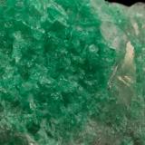 Beryl (variety emerald), Calcite<br />La Pita mining district, Municipio Maripí, Western Emerald Belt, Boyacá Department, Colombia<br />47x24x34mm<br /> (Author: Fiebre Verde)