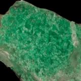 Beryl (variety emerald), Calcite<br />La Pita mining district, Municipio Maripí, Western Emerald Belt, Boyacá Department, Colombia<br />47x24x34mm<br /> (Author: Fiebre Verde)