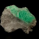 Beryl (variety emerald), Calcite<br />La Pita mining district, Municipio Maripí, Western Emerald Belt, Boyacá Department, Colombia<br />47x24x34mm<br /> (Author: Fiebre Verde)