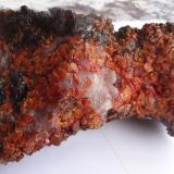 Vanadinite, Mottramite, Barite, Calcite<br />ACF Mine area, Mibladen mining district, Mibladen, Midelt, Midelt Province, Drâa-Tafilalet Region, Morocco<br />19 X 9 X 7 cm<br /> (Author: Dave van Bladel)