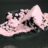 Rhodochrosite, Goethite<br />Santa Eulalia District, Municipio Aquiles Serdán, Chihuahua, Mexico<br />11.0 x 5.3 x 5.0 cm<br /> (Author: Don Lum)