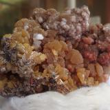 Mimetite, Dolomite and Calcite on Limonite.<br />Ojuela Mine, Mapimí, Municipio Mapimí, Durango, Mexico<br />7,5x5x5cm<br /> (Author: Dave van Bladel)