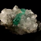 Beryl (variety emerald), Calcite<br />La Pita mining district, Cunas Mine, Municipio Maripí, Western Emerald Belt, Boyacá Department, Colombia<br />31x21x20mm, xl=16x4mm<br /> (Author: Fiebre Verde)