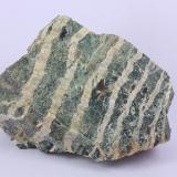 Crisotilo en Serpentina (Grupo)Jebel Bou Frokh, Distrito minero Bou Azzer, Provincia Zagora, Región Drâa-Tafilalet, Marruecos10 x 9 cm (Autor: Iván Blanco (PDM))