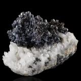 Pyrargyrite on Quartz<br />Taxco de Alarcón, Municipio Taxco, Guerrero, Mexico<br />9,0	x	6,0	x	6,5	cm<br /> (Author: MIM Museum)