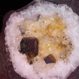 Goethite, Calcite, Quartz<br />State Route 1 road cut, Woodbury, Cannon County, Tennessee, USA<br />12 x 15 mm. the cube<br /> (Author: jordanlowe1089)