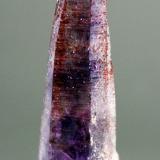 Quartz (variety amethyst) with inclusions of Goethite<br />Brandberg area, Erongo Region, Namibia<br />6.7 x 2.5 cm<br /> (Author: Don Lum)