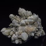 Quartz, Calcite<br />San Antonio Mine (San Antonio el Grande Mine), East Camp, Santa Eulalia District, Municipio Aquiles Serdán, Chihuahua, Mexico<br />8.8 x 6.4 cm<br /> (Author: am mizunaka)