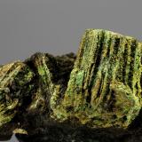 Bournonite covered by Bindheimite and Malachite<br />Felixbau Mine, Friesach-Hüttenberg area, Hüttenberg, Sankt Veit an der Glan, Carinthia/Kärnten, Austria<br />FOV 5 cm<br /> (Author: Gerhard Brandstetter)