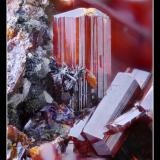 Realgar and StibniteMina Getchell, Pico Adam, Distrito Potosi, Montes Osgood, Condado Humboldt, Nevada, USAfov 3.5 mm (Author: ploum)