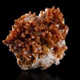 Vanadinite<br />San Carlos Mine (Apex Mine), San Carlos, Municipio Manuel Benavides, Chihuahua, Mexico<br />9,0	x	8,0	x	5,0	cm<br /> (Author: MIM Museum)