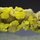 Sulfur on Calcite<br />Agrigento (Girgenti) Province, Sicily, Italy<br />65 mm<br /> (Author: Gerhard Brandstetter)
